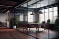 a modern open space office with glass walls, sleek furniture and cool lighting Royalty Free Stock Photo