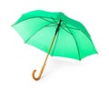 Modern opened green umbrella on white