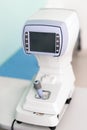 Modern ophthalmology clinic. Keratometer device measuring curvature of cornea. Prevention of astigmatism desease. High Royalty Free Stock Photo