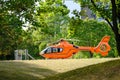 Modern orange helicopter, Eurocopter arrived to provide urgent medical care to patients, Air medical services, Rapid Response Royalty Free Stock Photo