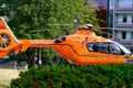 modern orange helicopter, Eurocopter arrived to provide urgent medical care to patients, Air medical services, Rapid Response Royalty Free Stock Photo