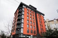 Modern orange residential multistory apartment buildings. Facade of new houses Royalty Free Stock Photo