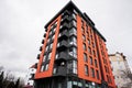 Modern orange residential multistory apartment buildings. Facade of new houses Royalty Free Stock Photo