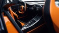 Modern orange supercar interior with the leather panel, sport seats, multimedia, and digital dashboard. View from the