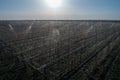 Modern orchard with sprayers for protection from frost in sring