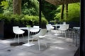modern outdoor seating area with sleek metal and plastic furniture