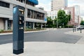 Modern parking meter on city street, space for text Royalty Free Stock Photo