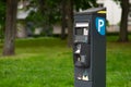 Modern parking meter outdoors. Space for text Royalty Free Stock Photo