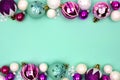 Christmas bauble double border on a turquoise background Royalty Free Stock Photo