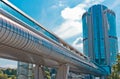 Modern pedestrian bridge and skyscraper