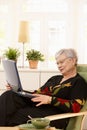 Modern pensioner with laptop