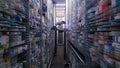 Modern pharmacy storage room With two robot hands that are arranging and storing out drugs in a pharmacy .