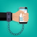 Modern phone internet and social networks addiction metaphor. Businessman hand chained symbol illustration