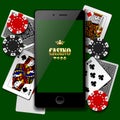 Modern phone on playing cards and casino chips background Royalty Free Stock Photo