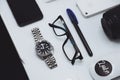 Modern photography equipment over white table background.