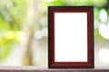 Modern Picture Frame placed on a wooden floor. Royalty Free Stock Photo