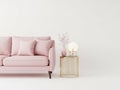 Modern pink sofa with side table isolated on white background Royalty Free Stock Photo