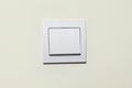 Modern plastic light switch on white wall, closeup Royalty Free Stock Photo