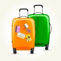 Modern plastic wheeled suitcases with travel tags