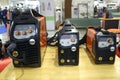 Modern portable semi automatic welding machines Jasic presented on stand in the exhibition hall. Industry exhibition