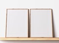 Modern poster frame mockup, minimal room design on white interior background, wooden frames mock up