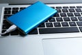 Modern power bank for charging on laptop Royalty Free Stock Photo