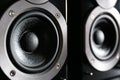 Modern powerful audio speakers as background, closeup Royalty Free Stock Photo