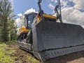 Modern powerful bulldozer. Heavy industry.