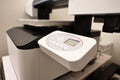 Modern printer in room, closeup. Printing equipment Royalty Free Stock Photo