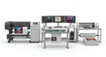 Modern Printing and Design Studio Setup with Large Format Printer Plotter Station Three Monitors and Paper Rolls on a Royalty Free Stock Photo