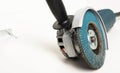 Modern professional angle grinder with a flap wheel on a white background. Power tool for work. Sanding wood and metal