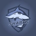 Modern professional logo for sport team. Shark mascot. Sharks, vector symbol on a dark background.