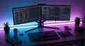Modern Programmer\'s Workspace with Dual Monitors and Neon Lighting Royalty Free Stock Photo