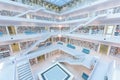 Modern Public City Library - STUTTGART, GERMANY - White interior with many white staircases. Beautiful mordern architecture