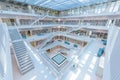 Modern Public City Library - STUTTGART, GERMANY - White interior with many white staircases. Beautiful mordern architecture