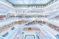 Modern Public City Library - STUTTGART, GERMANY - White interior with many white staircases. Beautiful mordern architecture Royalty Free Stock Photo