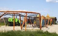 Modern public playground against the blue sky. A colorful play and sports complex for children without people. Equipment for rock Royalty Free Stock Photo