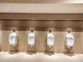 Modern Public Restroom Urinals in a Clean and Spacious Facility Royalty Free Stock Photo