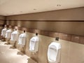 Modern Public Restroom Urinals in a Clean and Spacious Facility Royalty Free Stock Photo