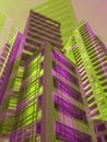 Modern purple and green talll residential buildings cluster in big city