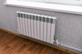 Modern radiator in the house or apartment. Household bimetallic batteries. Panel water radiator system in a residential