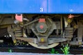 Modern railway pair of wheels with shock absorbers on rails Royalty Free Stock Photo