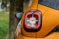 Modern rear light of a car. Brake light and arrow of large suv. Royalty Free Stock Photo