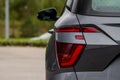 Modern rear light of a car. Brake light and arrow of large suv. Royalty Free Stock Photo