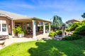 Modern Rear Yard Patio Setting With Fountain