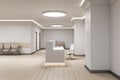 Modern reception desk with computer in medical office interior Royalty Free Stock Photo
