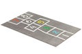 Modern rectangular gray rug with a hopscotch pattern. 3d render