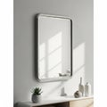 Modern rectangular wall mirror with decorative shelf Royalty Free Stock Photo