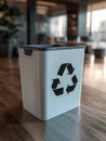 Modern recycling bin in a stylish office environment. Royalty Free Stock Photo