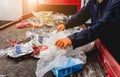 At modern recycling plant. Separate garbage collection. Workers sorting trash Royalty Free Stock Photo